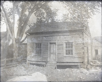 This hewed log cabin was originally John and Avis Gwenn Hinton's home. It was located near the Avis railroad crossing.