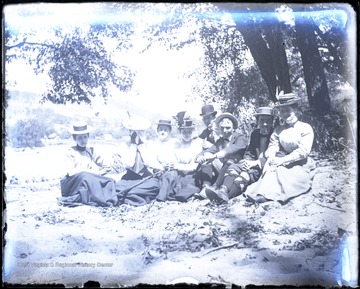Unidentified group of young people pose during an outing. 