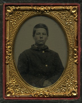 Probably a tintype photograph of an unidentified boy.