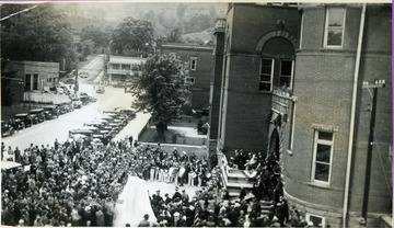Large crowd gathers at the Tucker County Courthouse for the dedication of a marker documenting the events during the Civil War battle in July 1861 where Confederate General Robert Garnett was killed, the first of many officers with the rank of general to die in the war.