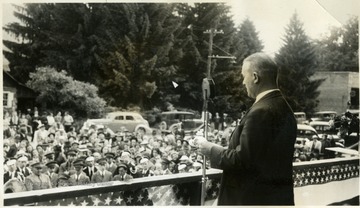 Holt delivers a speech at the dedication ceremony for the marker documenting the Civil War battle at Corricks Ford. Inscription on the marker: "Engagement between Federal troops under Gen. T. A Morris and Confederate troops under Gen. R. S. Garnett, one mile south, July 13, 1861. Garnett, mortally wounded in this action, was the first general to fall during this war . . ."