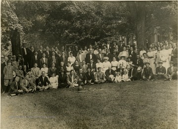 Group portrait of unidentified members and their families.