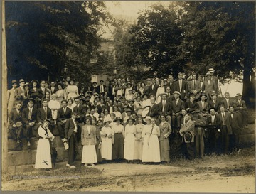 Only identified student and/or staff is Minnie Kendall Lowther, 1st row, far left (marked with "X").