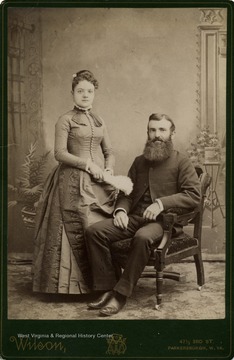 Two members of the Maxwell family pose for a portrait.