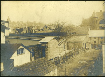 Morgantown Central School can be seen in the background. From the Rumsey Collection