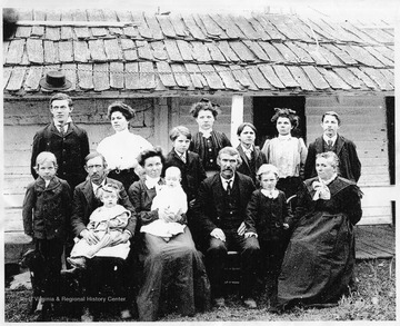 Information with the Photograph: "First Row L to R: Dallas Kight, Albert Kight, Ethel Kight Stump (baby), Gertrude Francis Kight, Ollie Kight Yoak (baby), Tommy Albert Francis, Henry Kight, Emma Hall Francis; Second Row: Joseph Lee Francis, Hattie Francis Ferrell, Orville Kight, Rilla Francis Harris, Jerome Francis, Annie Francis Trippett, Hagan Tommy Francis