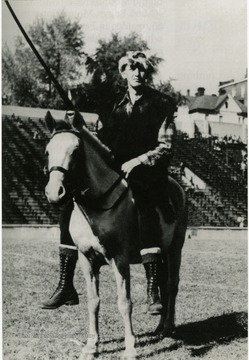 Mountaineer Boyd Arnold rides his horse on Old Mounatineer Field. Arnold was the University's mascot 1937 - 1939.