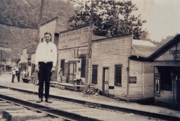 Unidentified man stands on the railroad track in Blair. Angry miners used these tracks to run hijacked trains loaded with thousands willing to fight in the Battle of Blair Mountain.