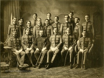 Commendant Major J. M. Burns; James Rogers Moreland seated, center. [#4 ]
