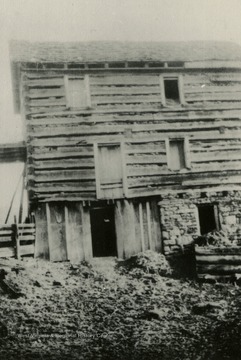 Rear view of the Worley Fort. The "Worleys" were considered the first settlers in Blacksville area, circa 1783. The building was three stories high. At one time had a barricade or stockade fence around it. Just before reaching the third floor, there was a fake floor about one and half feet high to slip children into in a prone position during periods of danger from Indian attacks.