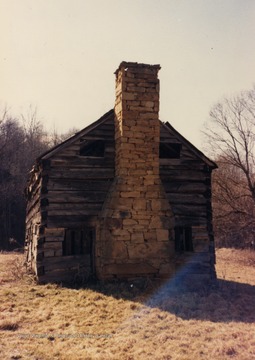 Josey Joseph Tennant log house across road from Methodist Church at Jakes Run, West Virginia. "Happy Wright with me when I took pictures"