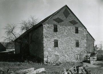Viewed from the South West. This barn has asymmetrical gable ends indicating it was built before 1840.