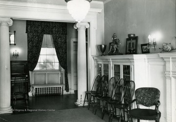 Interior of the house, west end of north wall of room to right of "?". Also known as Shepard Hall, the structure was built in 1798 by Moses Shepard.