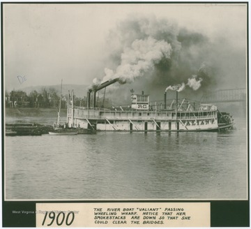 The "Valiant" steaming by the Wheeling Wharf. Notice her smokestacks are reclined so she could clear the bridges