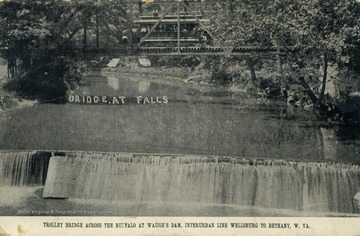 Trolley seen traveling over bridge at falls. See original for correspondence. (From postcard collection legacy system.)