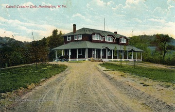 Dirt road leads to Cabell Country Club building where a car is parked. Published by Kiger's Book Store. (From postcard collection legacy system.)