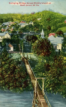 Wooden walking bridge leading into neighborhood. Published by S. P. Smith. (From postcard collection legacy system.)