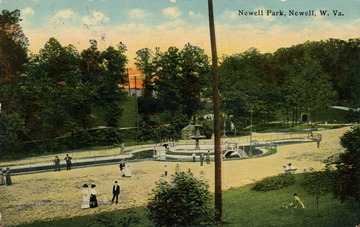 People gather around the fountain at Newell Park. See original for correspondence. (From postcard collection legacy system.)