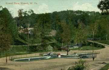 View of the fountain at Newell Park. See original for correspondence. Published by The Valentine &amp; Sons Publishing Company. (From postcard collection legacy system.)