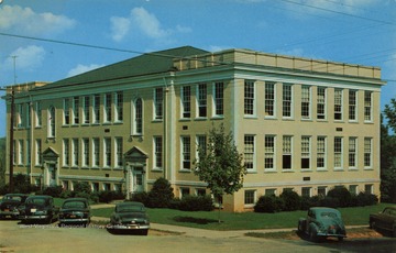 Caption on back of postcard reads: "A three story building opened in 1942. The first floor is devoted to a social room, laboratories for foods, dietetics, health services, textiles and clothing, geology lectures and laboratory. The second floor is devoted to biology, museum, plant room and animal room. The third floor has a classroom and laboratories for elementary and advanced chemistry, weighing room, and classroom and laboratory for physics." Published by Naturecraft. (From postcard collection legacy system.)