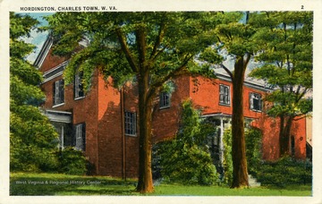 Caption on back of postcard reads: "The colonial home of Charles Washington, a brother of George Washington, and founder of Charles Town. He built the wings of the present house and called it "Happy Retreat." In 1833 Judge Douglass completed the center part, modeling it after "Mordington," the Douglass ancestral home in Scotland." Published by Nichols, Drug Store. (From postcard collection legacy system.)