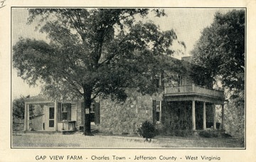 Caption on back of postcard reads: "House is three-fourths stone, both inside and outside walls mostly two feet deep. Three chimneys, fireplaces in all rooms except one bedroom. Automatic heat, oil, General Electric furnace. Small frame section Select Cypress. Window sills, etc., choice oak, almost two hundred years old and perfect. Very old house, modernized in every detail such as floor plugs, insulation, etc." (From postcard collection legacy system.)