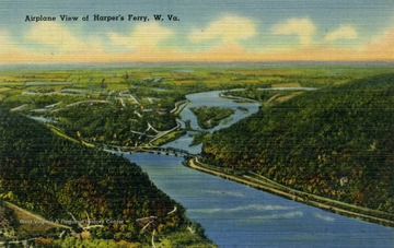 Caption on back of postcard reads: "Harper's Ferry, West Virginia is the lowest point in the State having an elevation of 272 feet above sea level. This view shows the confluence of the Shenandoah and Potomac Rivers." Published by Nichols &amp; Stuck. (From postcard collection legacy system.)