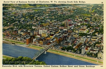 Caption on back of postcard reads: "The business section of Charleston running north from the Kanawha River with the Elk River in the left background." Showing South Side Bridge, Kanawha Blvd. with Riverview Terrace, United Carbon, Ruffner Hotel, and Union Buildings. Published by The A.W. Smith News Agency. (From postcard collection legacy system.)