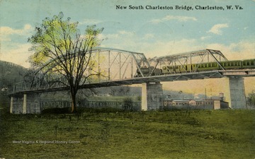 Train travels across the New South Charleston Bridge. See original for correspondence. (From postcard collection legacy system.)