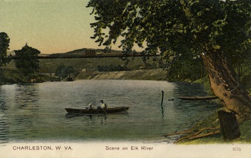 Man and child out on a boat on the Elk River. Published by Paul C. Koeber Company. (From postcard collection legacy system.)