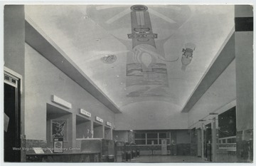 Black and white photo revealing the interior view of the terminal building including a ceiling mural painted by artist Robert Lepper. (From postcard collection legacy system.)