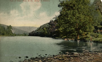 Woman stands by the river to the right. (From postcard collection legacy system.)