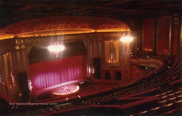 Caption on back of postcard reads: "Wheeling's Capitol Music Hall is the pivotal building in a National Historic District. Built in 1928, it is one of the finest examples of architectural beauty in the nation. It is home of Jamboree U.S.A. and also hosts the Wheeling Symphony Orchestra and many professional and amateur music, theatre, and dance companies." Published by Paige Creations. (From postcard collection legacy system.)