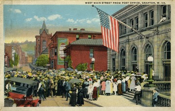 Gathering of people outside of the United States Post Office building. Published by I. Robbins and Son. (From postcard collection legacy system.)