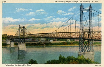 Caption on back of postcard reads: "The Parkersburg-Belpre Bridge on U.S. Route 50 and near Ohio 7 was built in 1915. Is of suspension type, four spans of 800 ft., 300 ft., 400 ft., and 200 ft., respectively. Roadway is 25 foot width, with a 5 foot sidewalk. Purchased by the State of W. Va. on June 17, 1937 for the sum of $1,088,000." Published by Genuine Curteich. (From postcard collection legacy system--subject.)