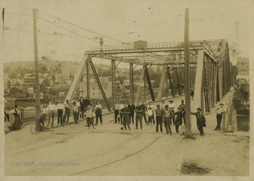 The bridge crosses the Monongahela River into Morgantown, which can be seen in the background of this photo. 