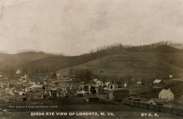 Homes in the town of Lorentz, West Virginia. Train going through town in bottom right corner.