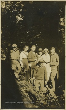 Girls and boys of the camp pose during their hike to the site.