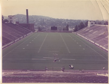 Photo showing the empty stadium overlooking the hills from across te Monongahela River. 