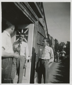 Max Cubbon, left, and Arbon Lang, right, outside of what is now known as West Virginia University's Stalnaker Hall. 