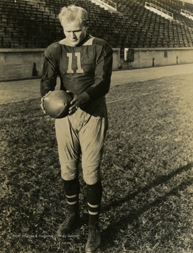 West Virginia University football player. Print number 186.