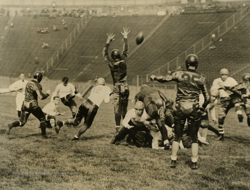 West Virginia University vs. University of Pittsburgh football game. Print number 198.
