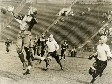 West Virginia University vs. University of Pittsburgh football game. Print number 199.
