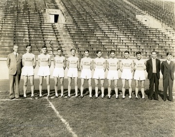 From left to right: Coach Art Smith, Price, Brand, Devers, Hill, Zimmerman, Leiphart, Boley, Hoult, Mohanna, Trainer Callaway, Manager Drinkard. Won 4, lost 1. Print number 250a.