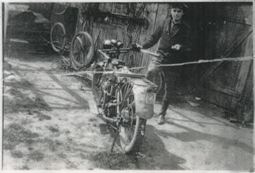 Willey pictured with his motor bike in the Avis section of town.