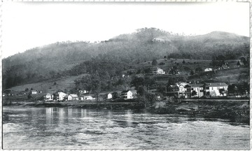 Large square house at left center is present day 510 Greenbrier Drive. View of upstream Greenbrier River from Foss Bridge location. 