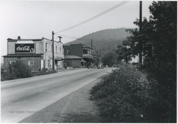 Stores beside the street sit at the old sight of the Foss Bridge entrance near Hinton, W. Va.