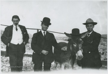 Drumheller and his associates pose with a mule.