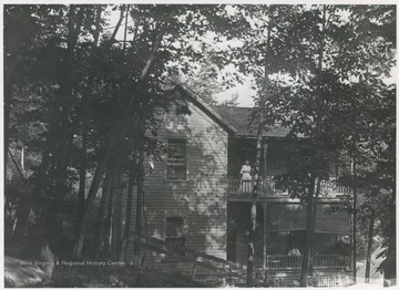 A woman and man are pictured on their porches. Subjects unidentified. 