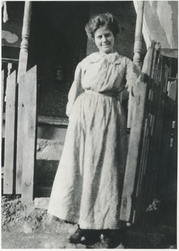 Senter pictured leaning against a gate.